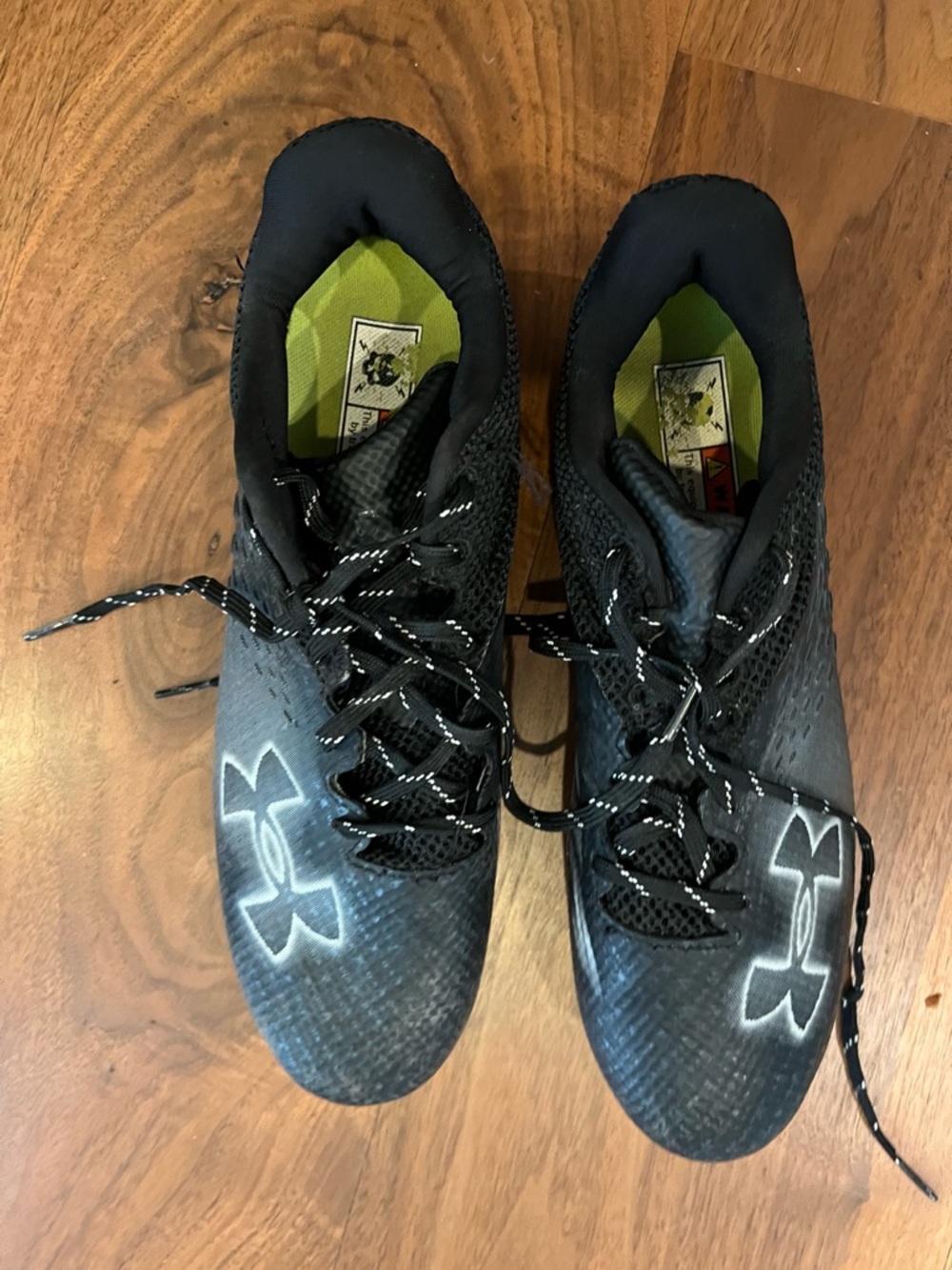 Under Armour Men’s Black Athletic  soccer Cleats, used but ready for more use